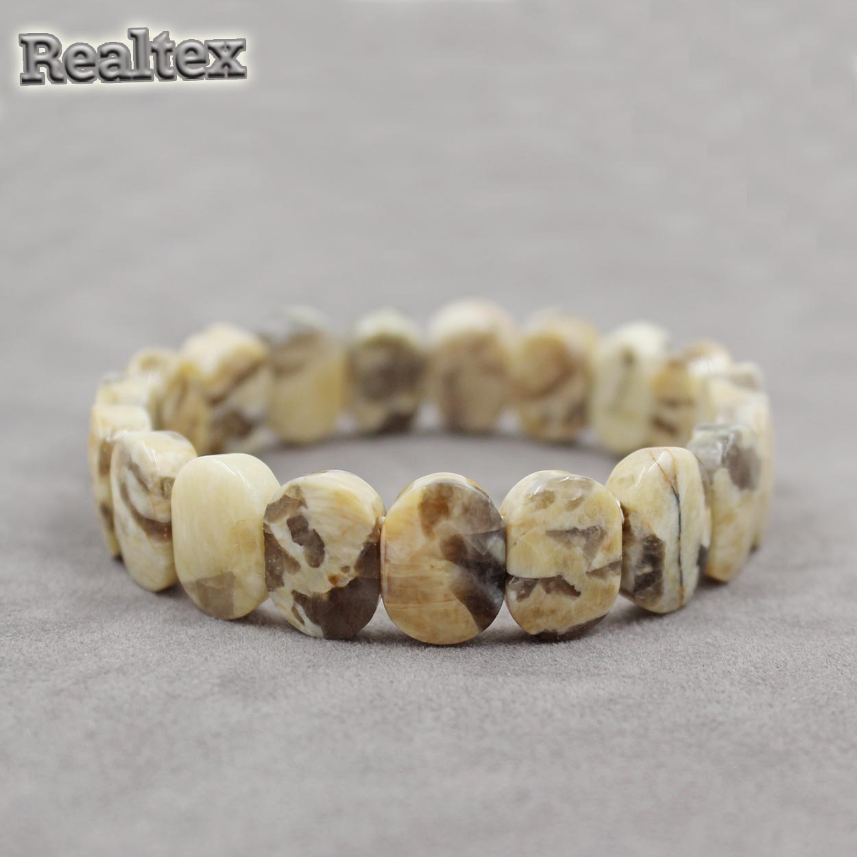 Браслет Realtex из натурального камня Овал граненый цв.бежевый