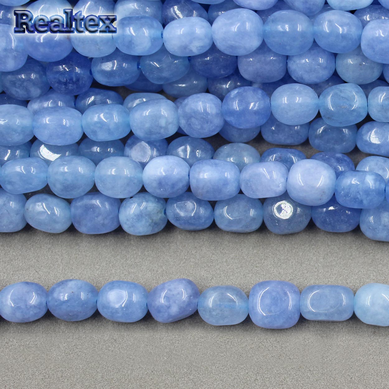 Бусины Реалтекс из натурального камня галтованного 8*10мм дл.38см (38шт) цв.голубой