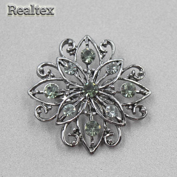 Брошь со стразами Realtex R-8-25 на планшете цв.черный никель