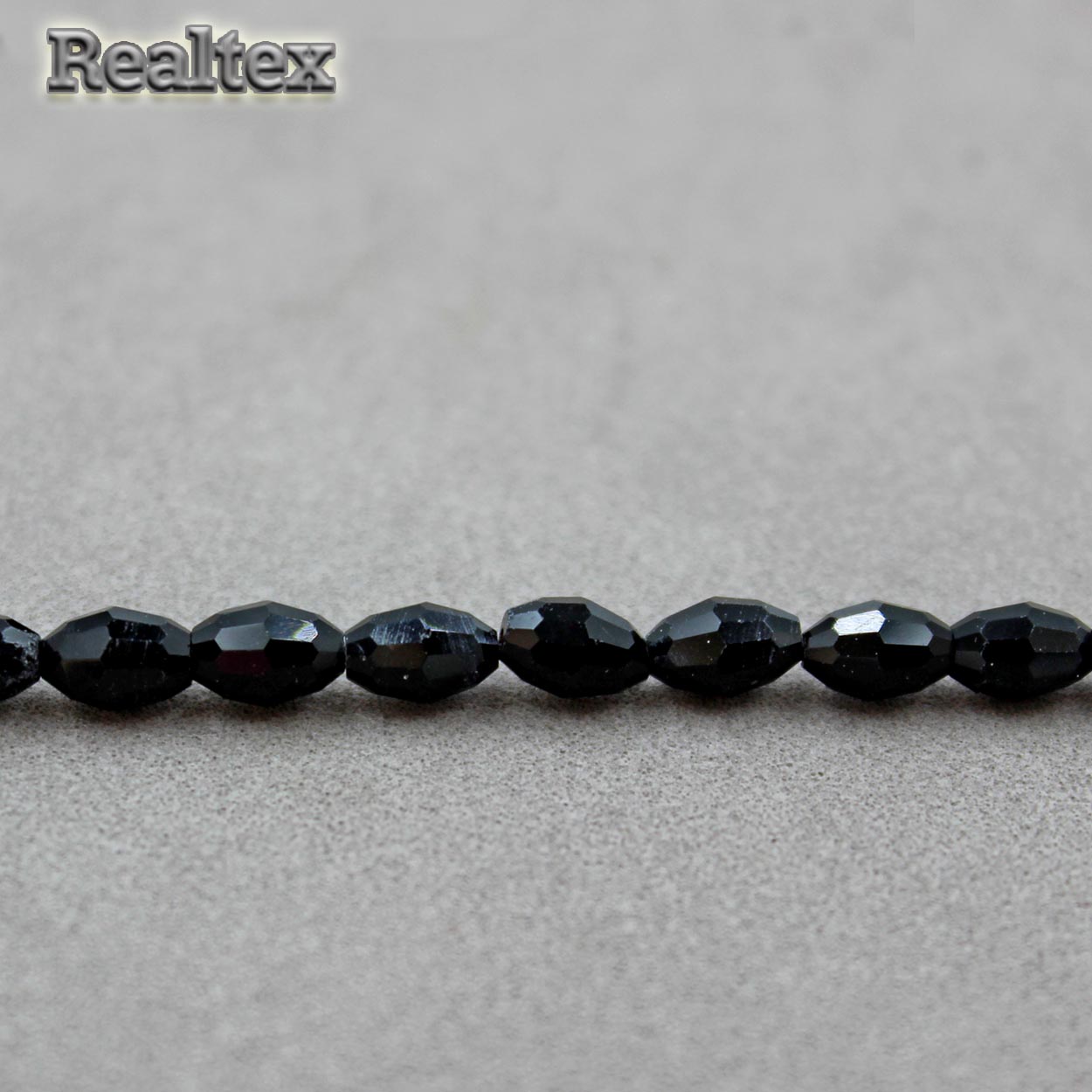 Бусины Реалтекс стеклянные граненые 4*6мм "Биконус" на нитях цв.02 черный