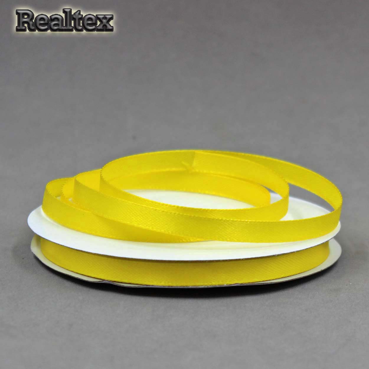 Лента атласная 6мм Realtex (27,4м) цв.023 желтый