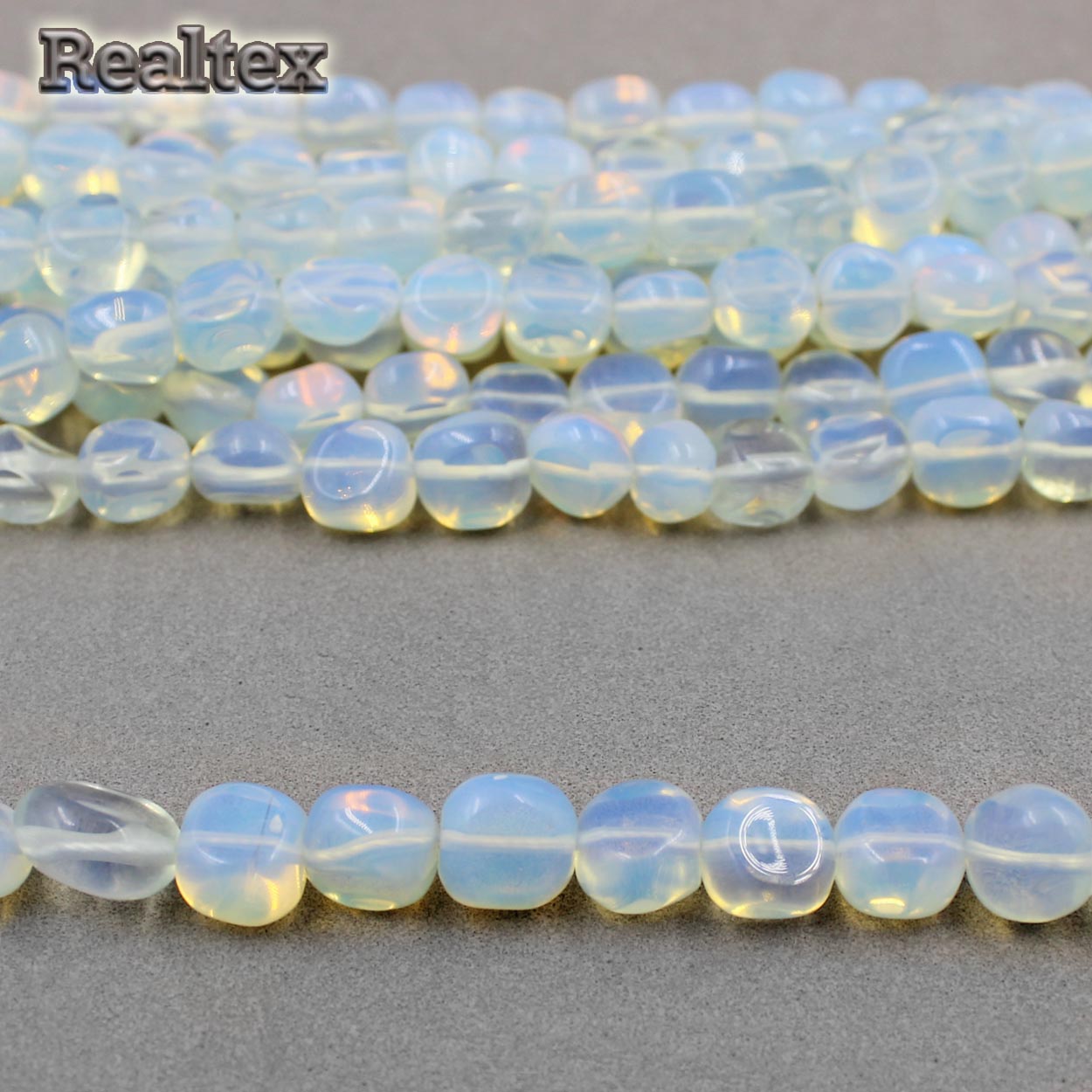Бусины Реалтекс из натурального камня Лунный камень (имитация) 8*10мм дл.39см (43шт) цв.прозрачный АВ