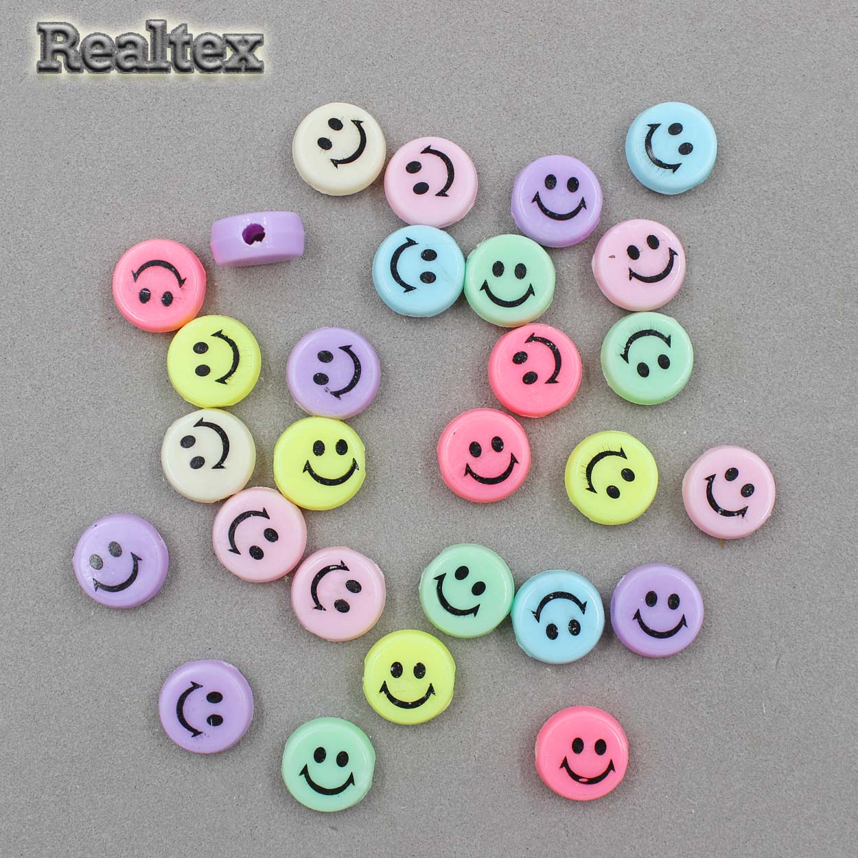 Бусины пластик Realtex Смайлик Таблетка (большой) (100гр) цв.mix/черн.рисунок