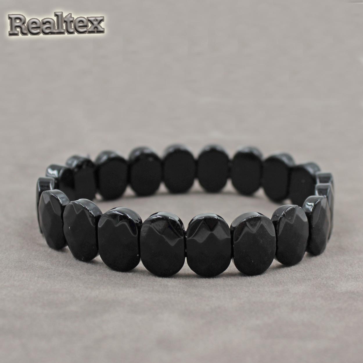 Браслет Realtex из натурального камня Овал граненый цв.черный