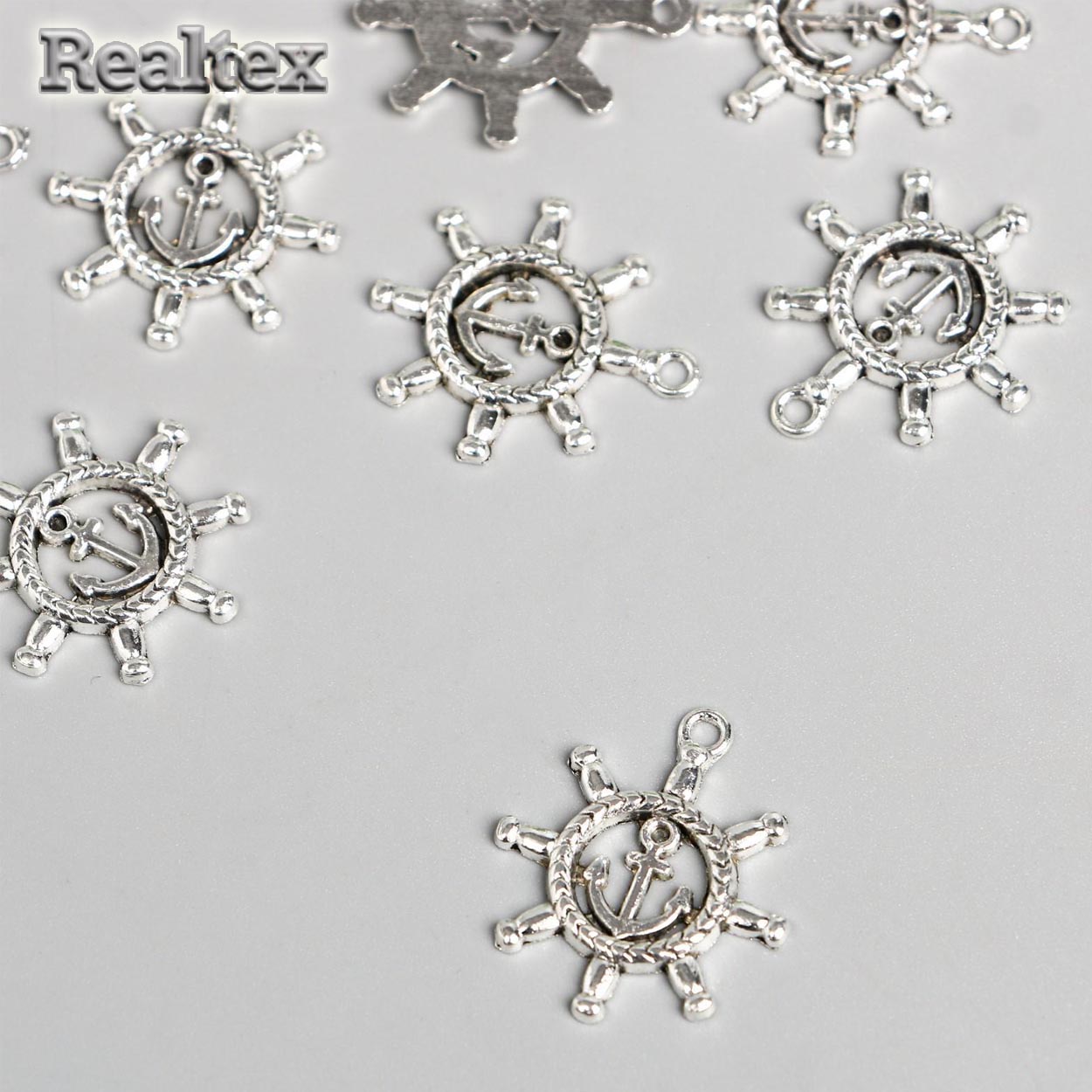 Подвеска металл 1409999 "Штурвал с якорем" 23*23мм 