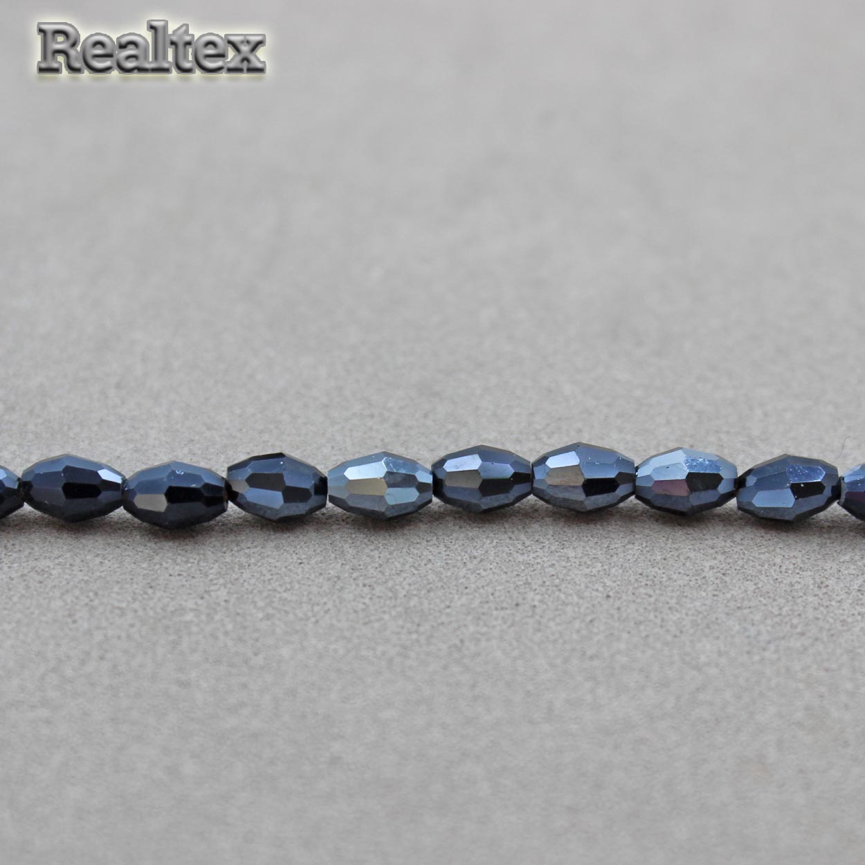 Бусины Реалтекс стеклянные граненые 4*6мм "Биконус" на нитях цв.32 гематит