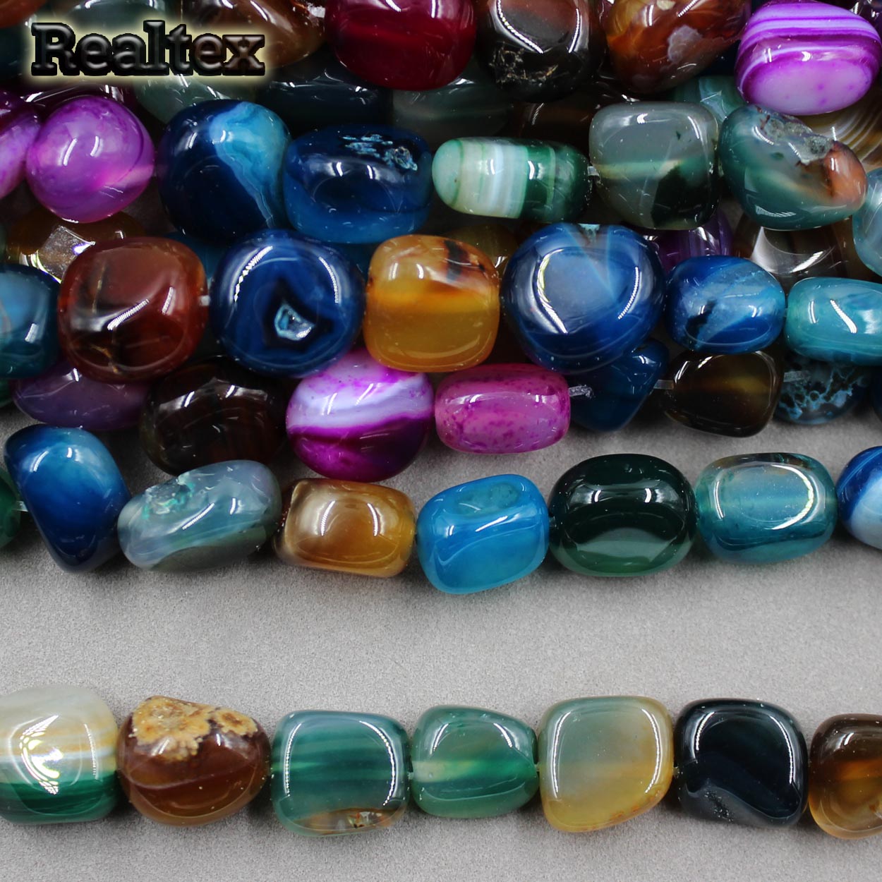 Бусины Реалтекс из натурального камня Агат галтованного 9*15мм дл.37см (24шт) цв.mix