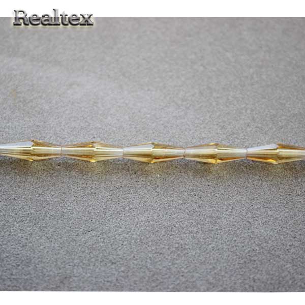 Бусины Realtex стеклянные граненые 4*12мм "Биконус" на нитях цв.07 золото