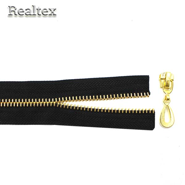 Молния металл Т.5 метражная с бегунками цв.золото/чёрный