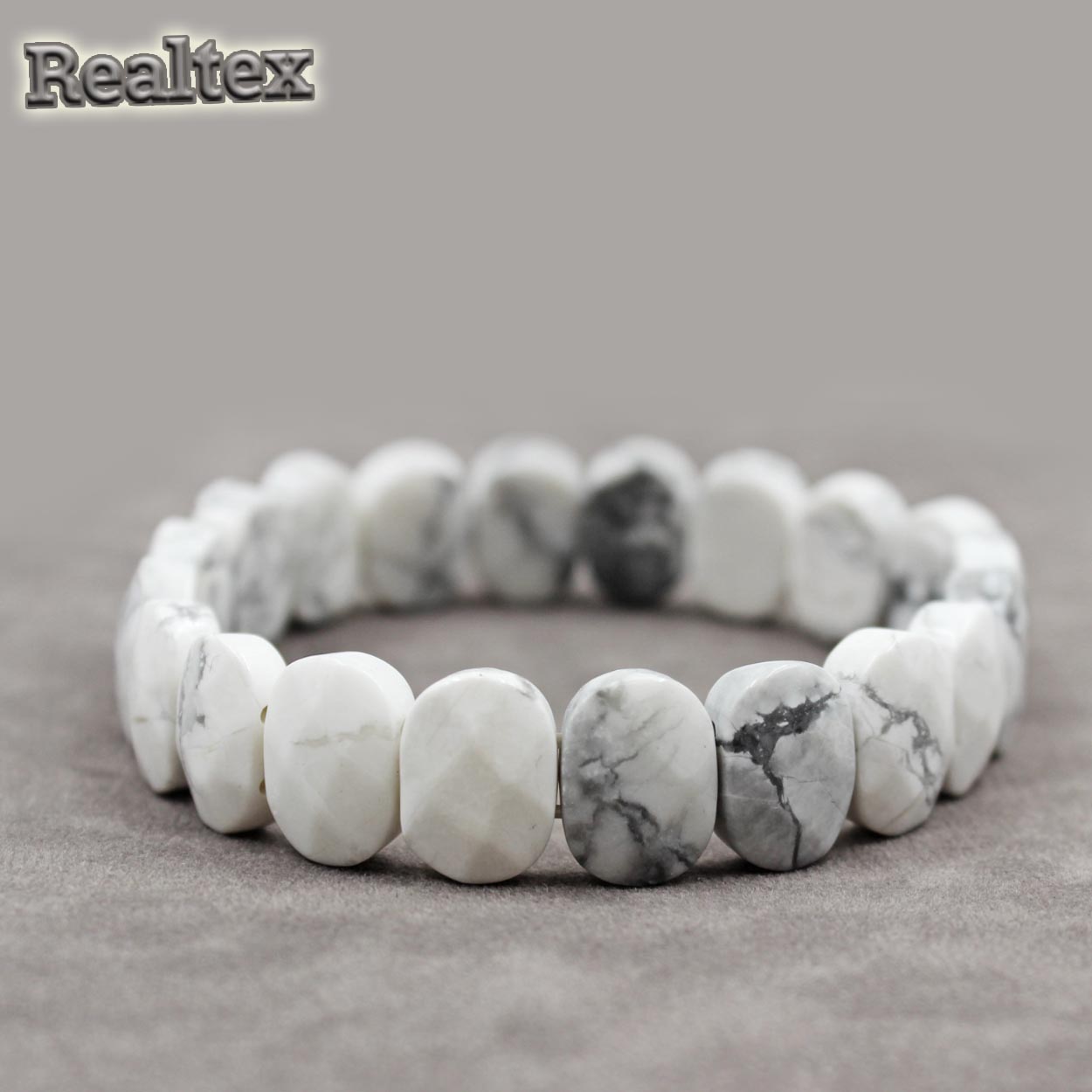 Браслет Realtex из натурального камня Овал граненый цв.белый