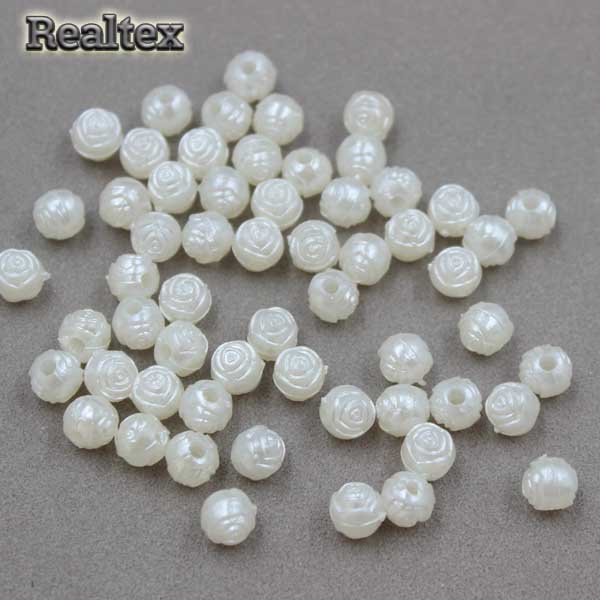 Бусины пластик Реалтекс Розочки 6мм (100гр) цв.молочный