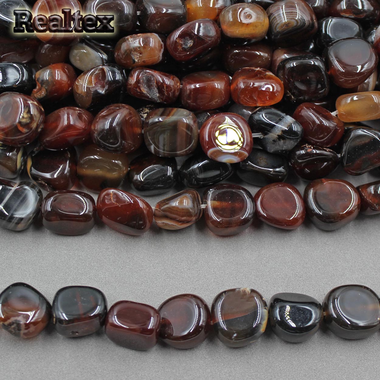 Бусины Реалтекс из натурального камня Агат галтованного 9*15мм дл.37см (24шт) цв.коричневый mix