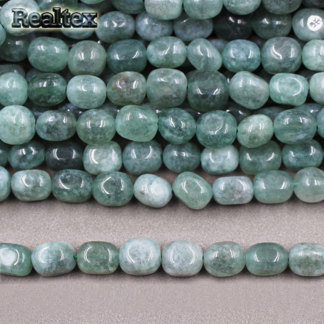 Бусины Realtex из натурального камня галтованного 8*10мм дл.38см (38шт) цв.полынь