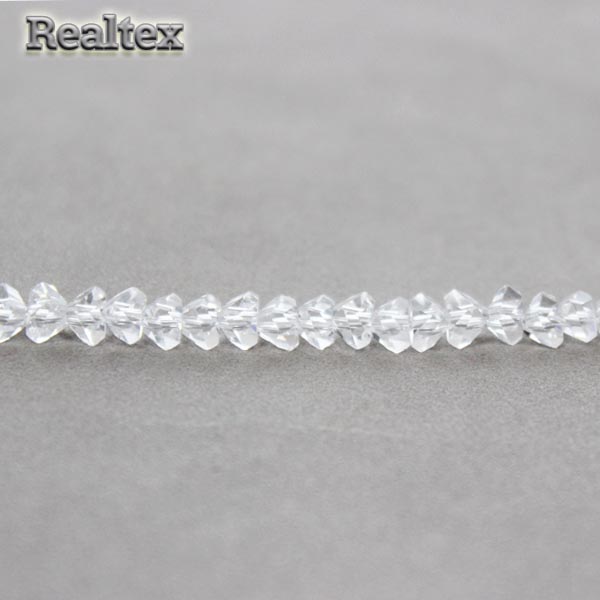 Бусины Реалтекс стеклянные со скошенными гранями 6мм "Пирамида" на нитях цв.01 прозрачный