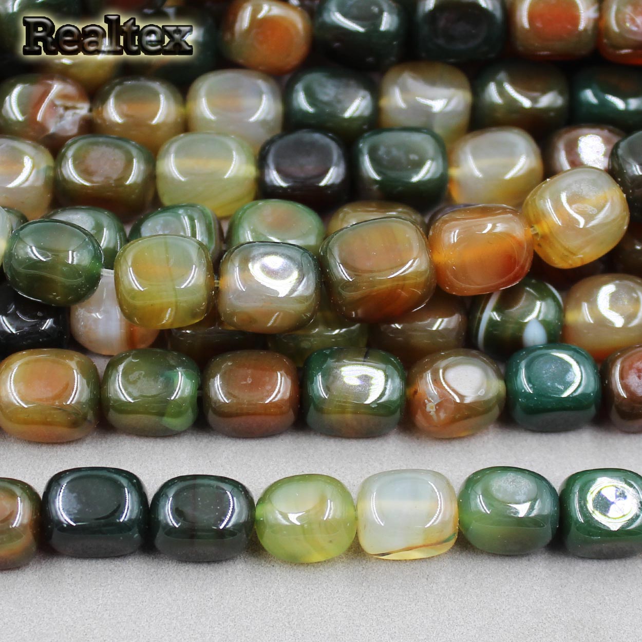 Бусины Реалтекс из натурального камня Агат галтованного 8*12мм дл.38см (32шт) цв.бежево-зеленый mix
