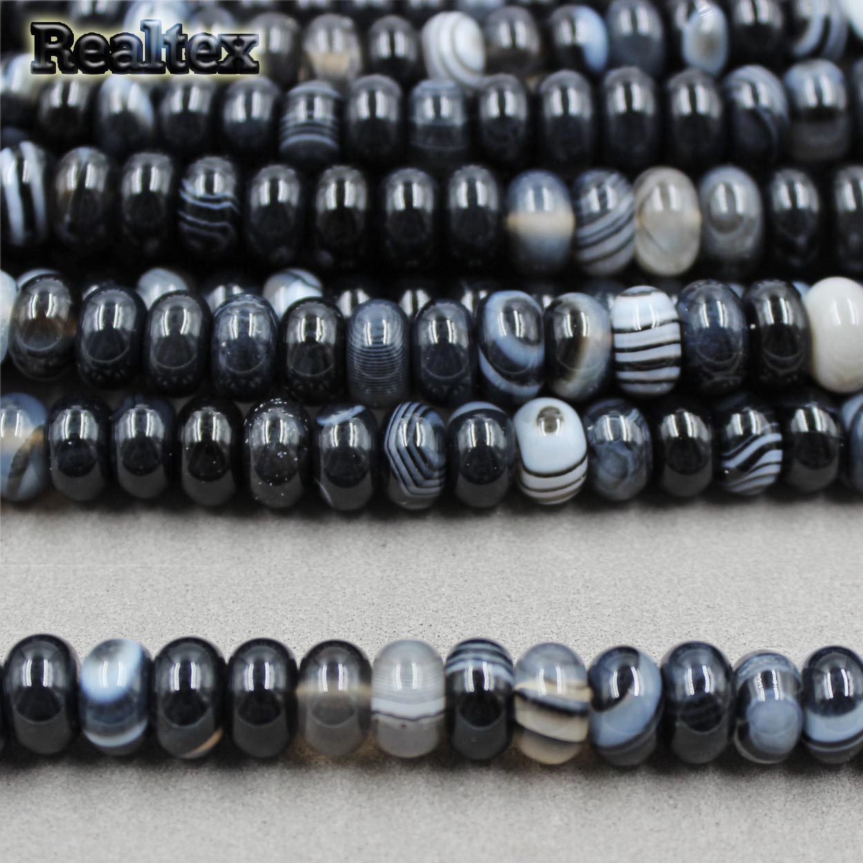 Бусины Реалтекс из натурального камня Агат рондель 5*8мм дл.38см (72шт) цв.черно-белый mix