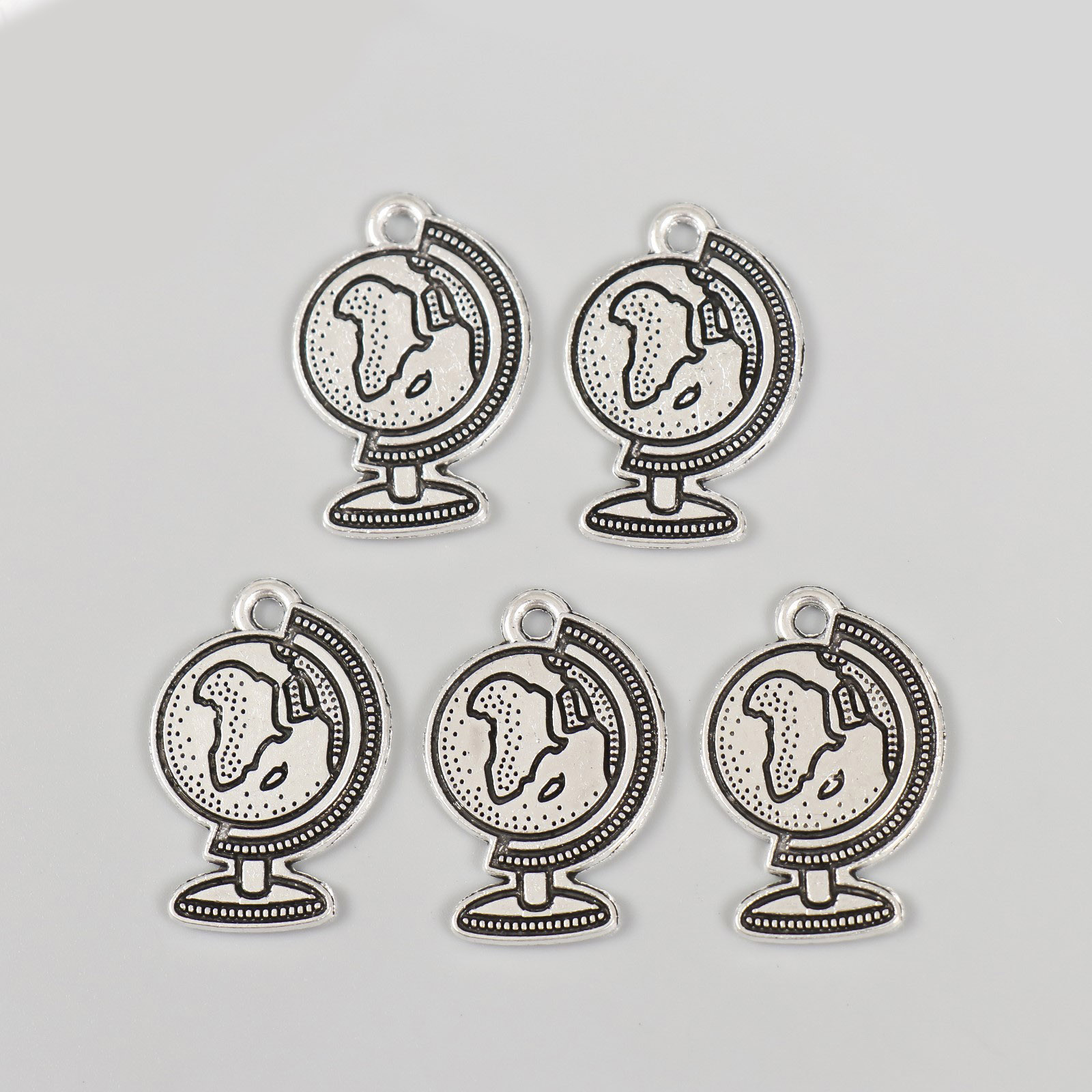 Подвеска металл 9715221 "Глобус" 25*18мм (5шт) цв.серебро
