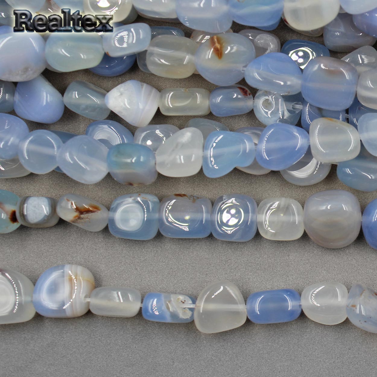 Бусины Реалтекс из натурального камня Агат галтованного 9*15мм дл.37см (24шт) цв.голубой mix