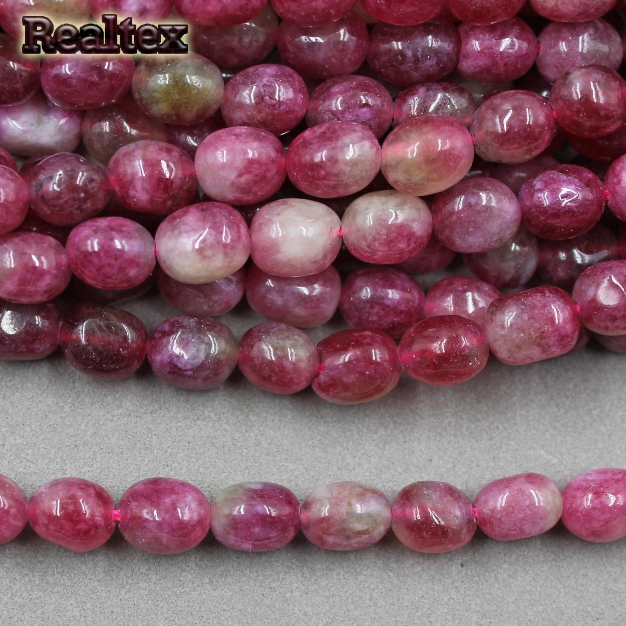 Бусины Реалтекс из натурального камня галтованного 8*10мм дл.38см (38шт) цв.темно пепельно-розовый