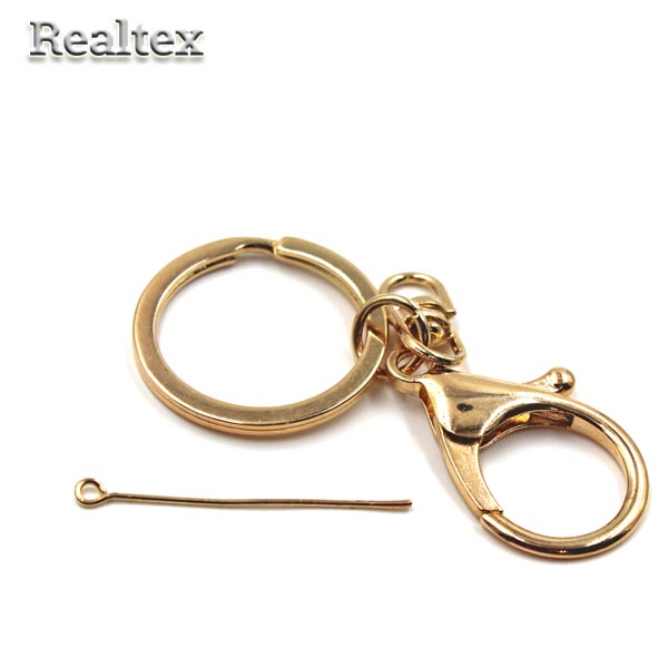  Кольцо с двумя карабинами Реалтекс для брелока цв.золото