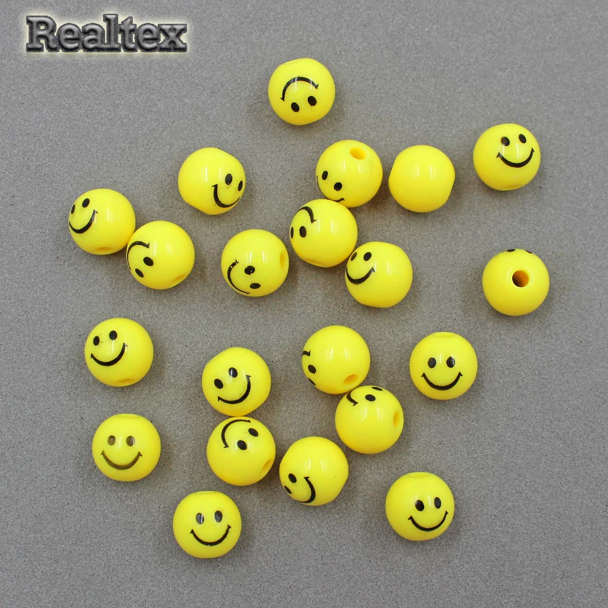 Бусины пластик Реалтекс Смайлик Шар 10мм (500гр) цв.желтый/черный рисунок
