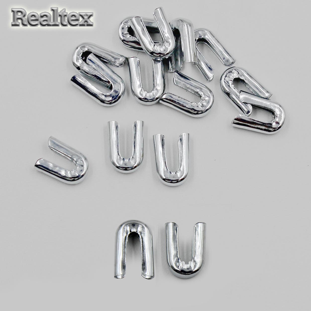 Наконечник Реалтекс для косточек в рулоне металл 5мм (1000шт) цв.никель