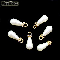 Бусины-подвесы со стразами пластик Realtex  8*15мм (25шт) цв.молочный/золото